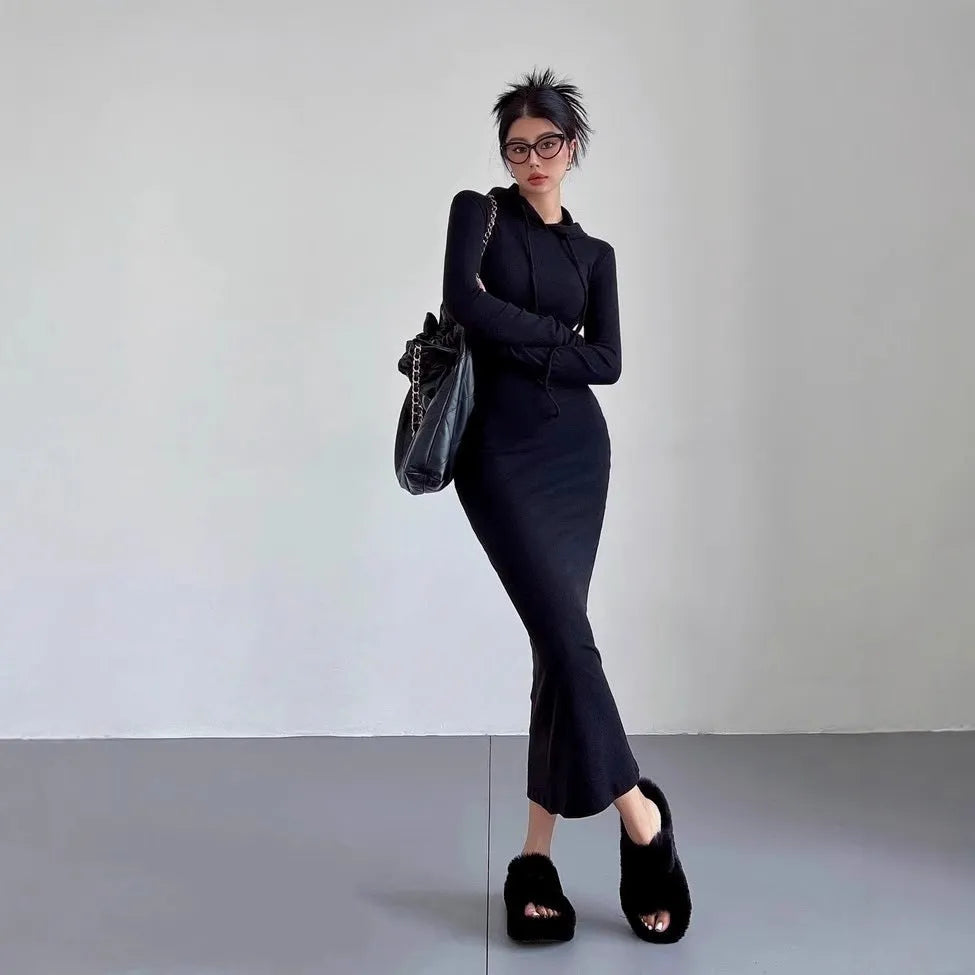 Women's grey hooded long sleeve sheath dress with a high waist on a hanger.