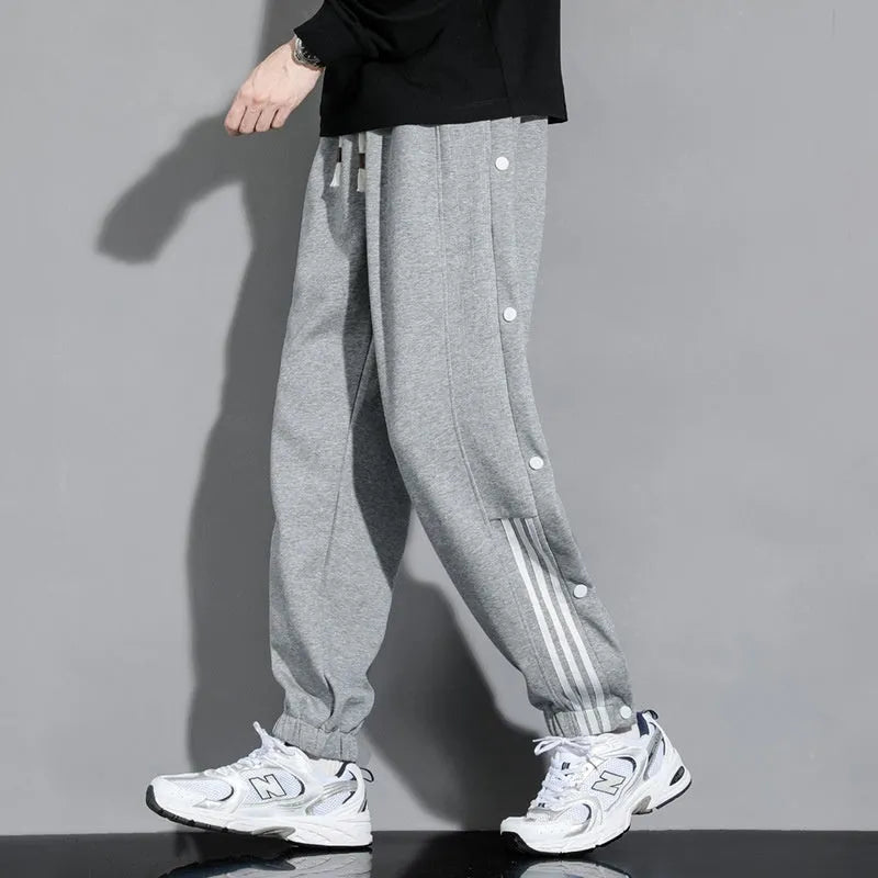 Men's loose cotton blend sweatpants with high waist and elastic drawstring in autumn colours