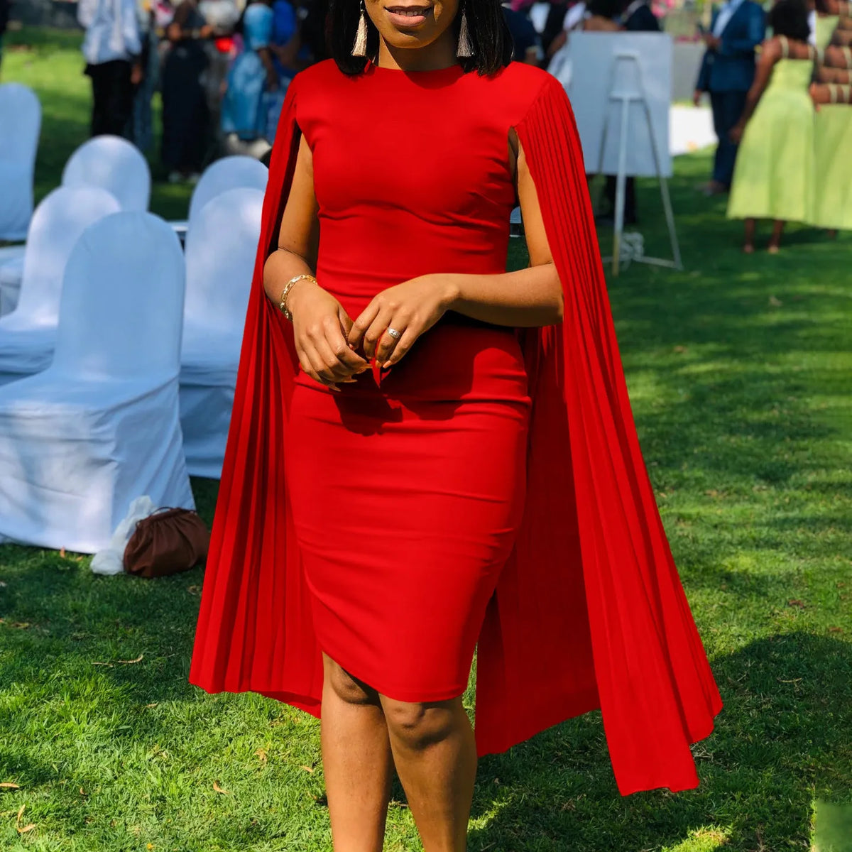 Women's long sleeve evening gown with pleated shawl collar and high waist in a choice of colours.