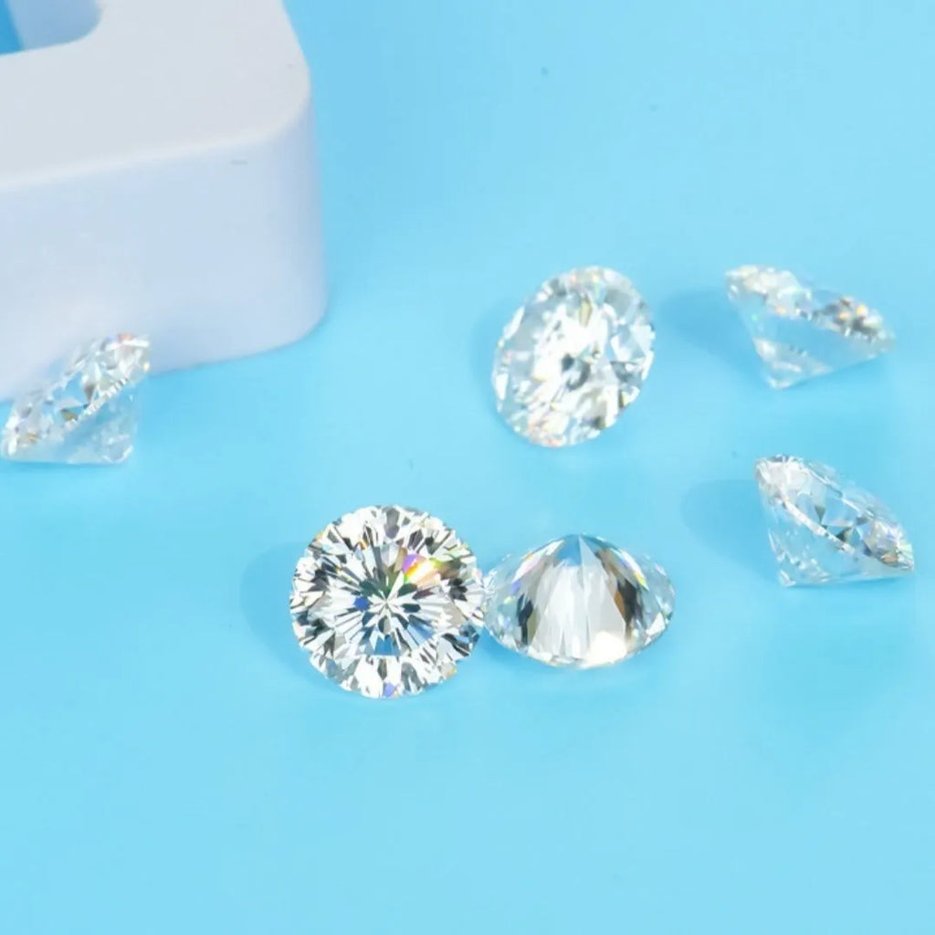 Round moissanite gemstone with eight hearts and eight arrows cut on a white background.