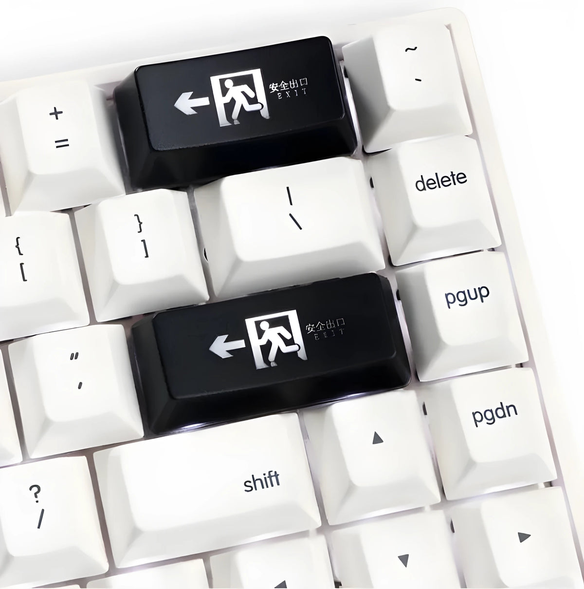 Transparent mechanical keyboard keycap with safety evacuation exit graphic in red text