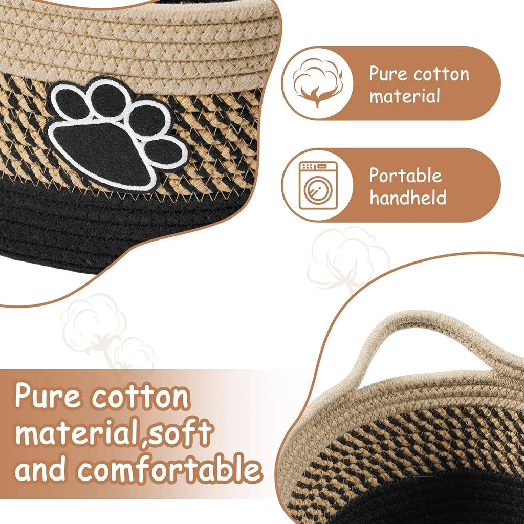 Handmade light beige woven cotton rope storage basket with wood and a handle.