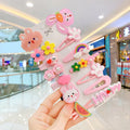 14-piece set of colourful toddler hair clips with rainbow, candy fruit, butterfly, and ice cream designs.