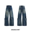 Men's verdant blue retro jeans with washed burst pattern showing curved knife fit and loose silhouette