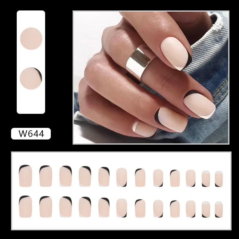 Black and white frosted artificial nails with mandarin duck colour design for French manicure