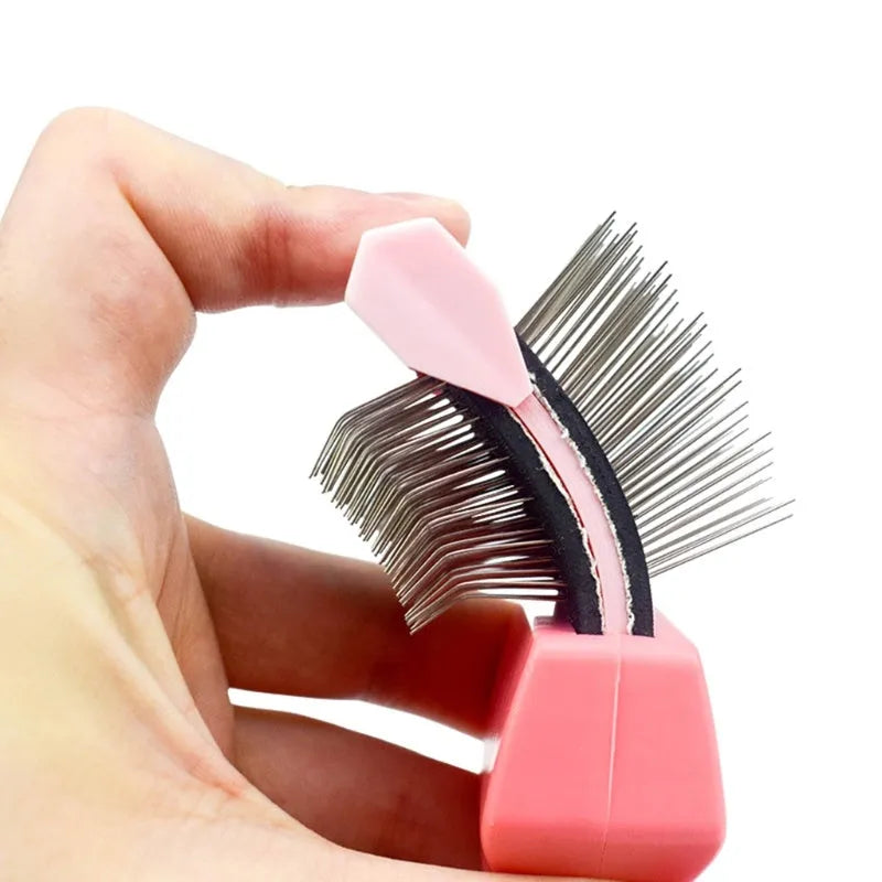 Blue double-sided pet brush with stainless steel pins and ergonomic handle for dog and cat grooming