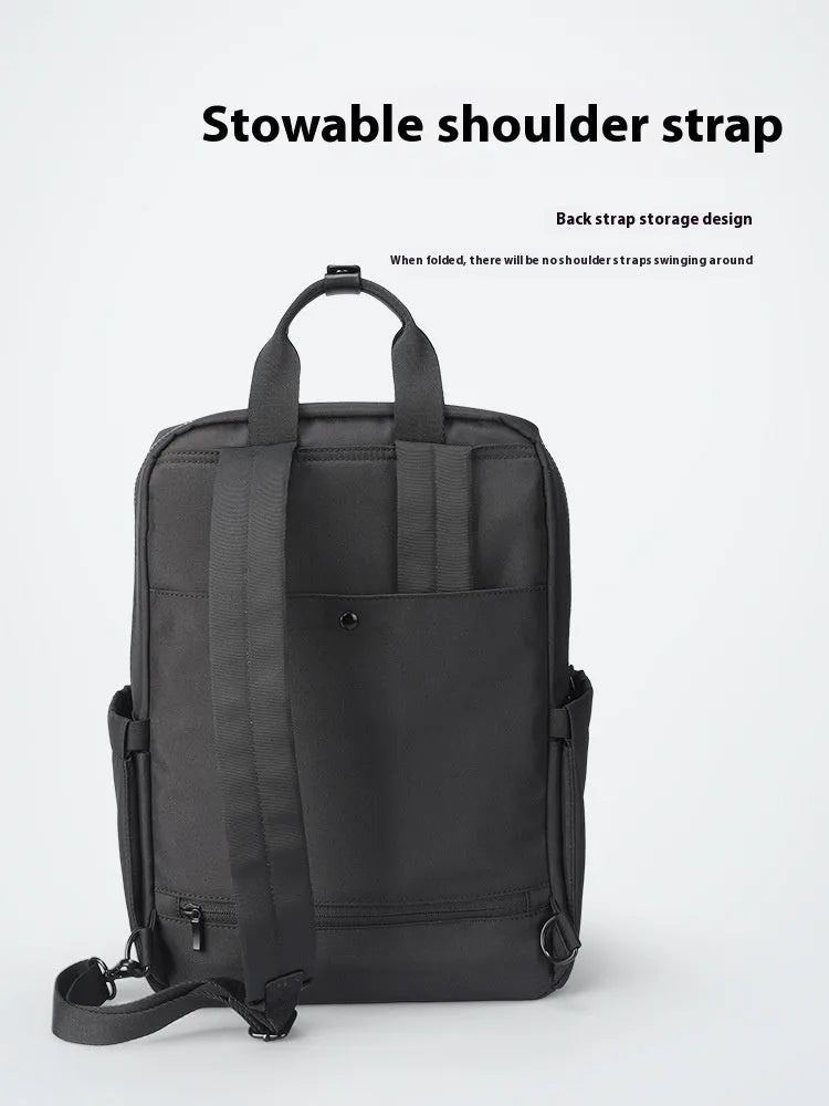 Elegant Black Oxford cloth computer backpack with a 20-35 litre capacity and polyester lining.