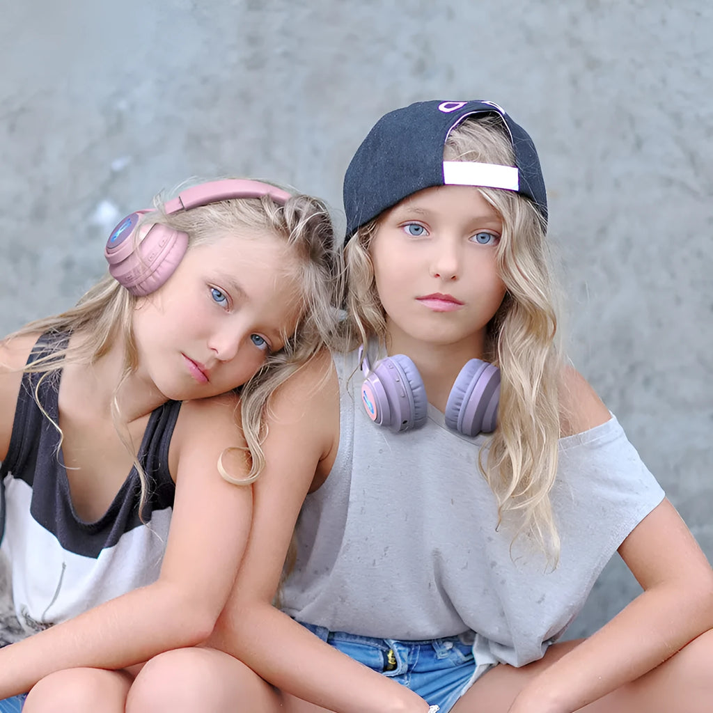 Wireless children's headphones with RGB lights in bunny purple colour showing stereo ear cups