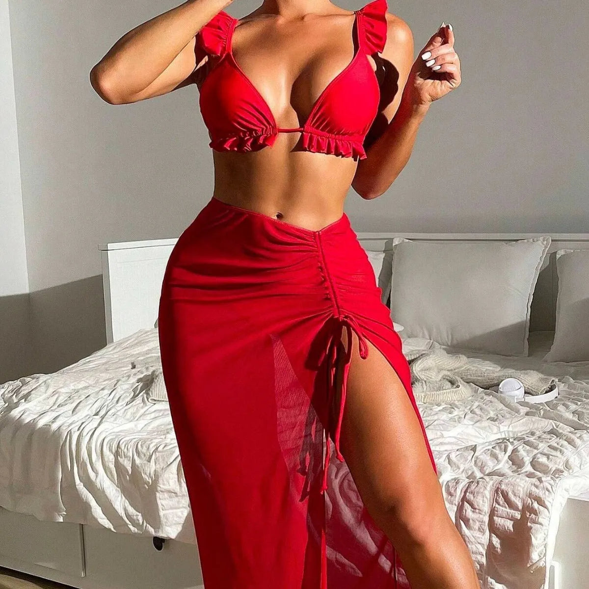 Women's three-piece bikini swimsuit set with coordinating skirt in various colour options