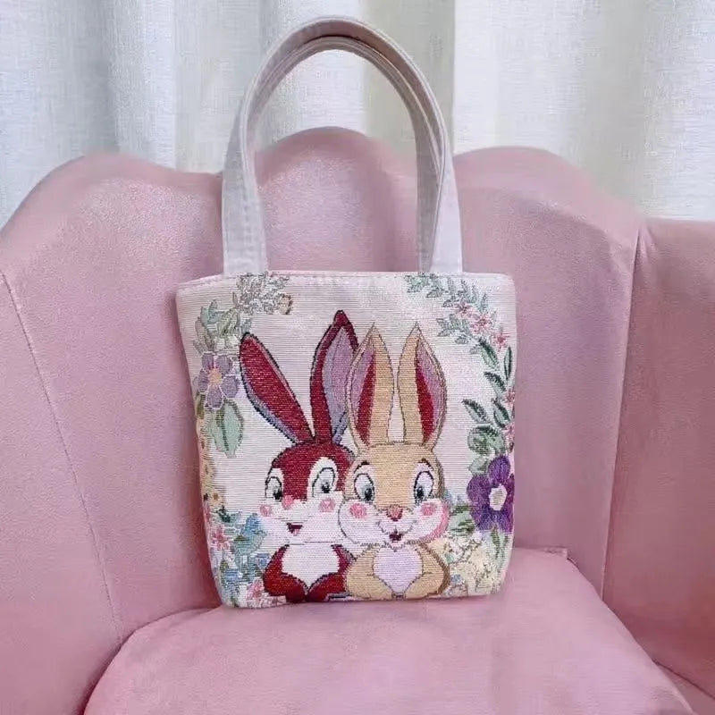 Double-sided gold wire embroidered canvas tote bag in botanical design with polyester construction