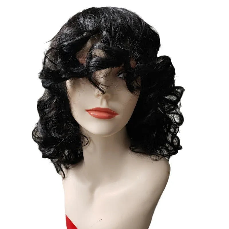 A woman wearing a long, black synthetic wig with tight Afro-textured curls.