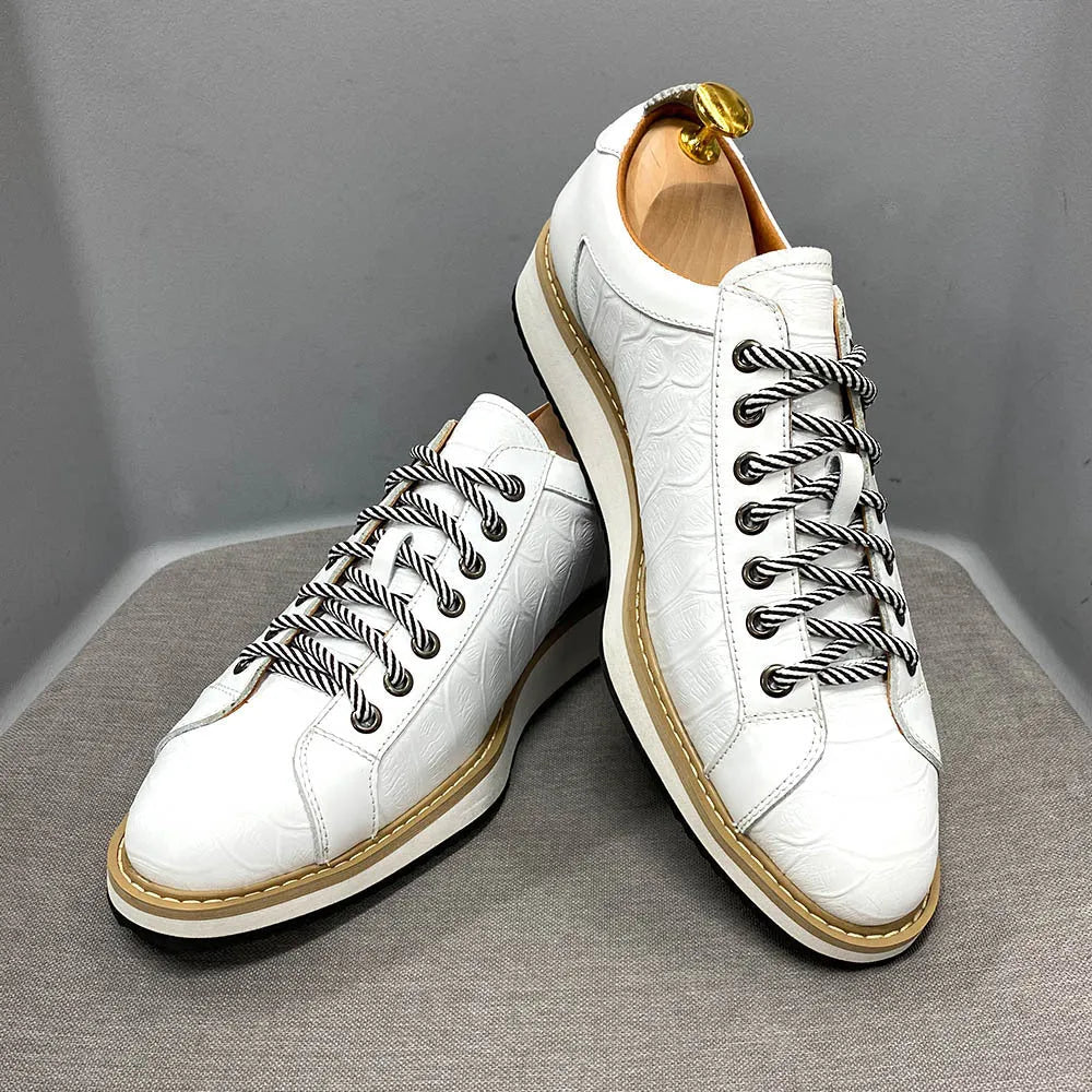 Men's handmade low-tube shoes with embossed pattern design and front tie closure in multiple colours