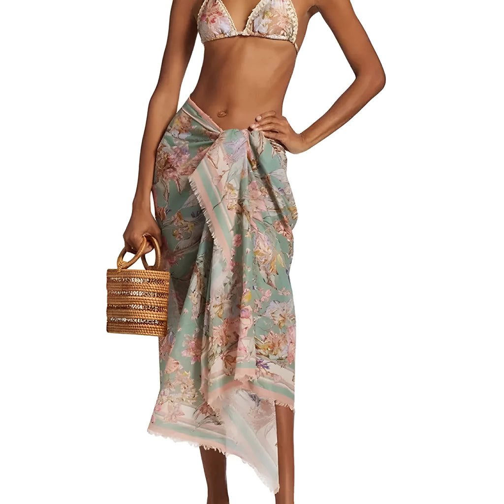 Women's floral pattern bikini set with briefs and matching skirt in creamy-white colour