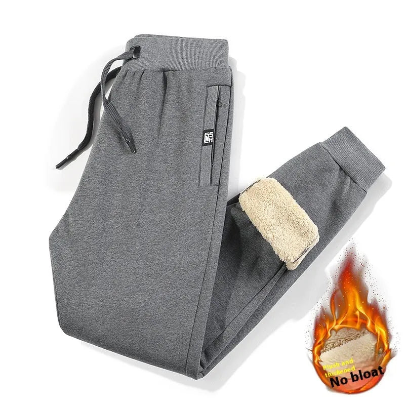 Men's gray fleece-lined track pants with elasticated waistband and straight leg design
