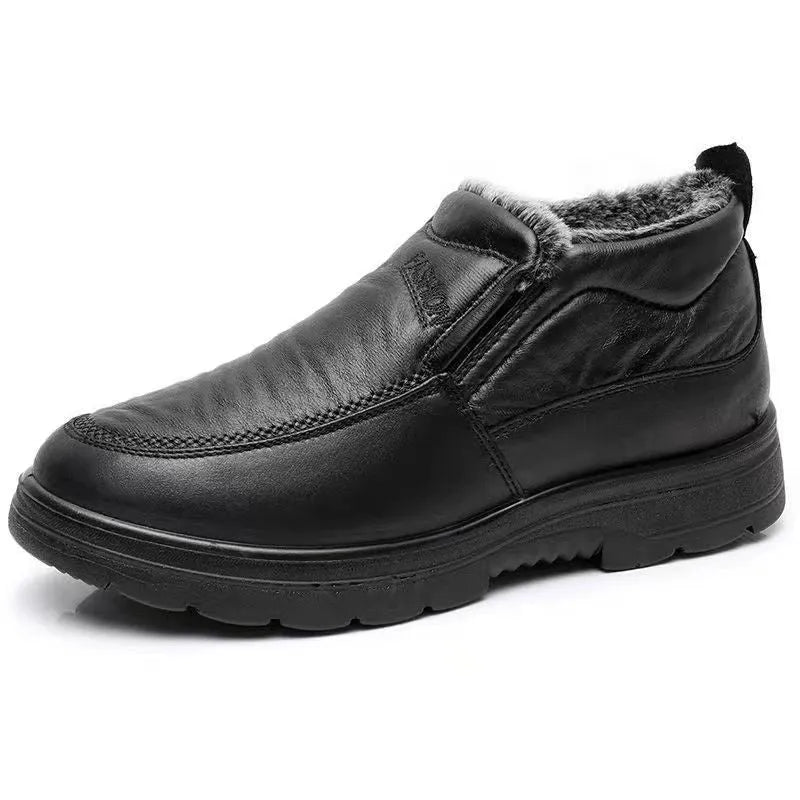 Men's black casual winter slip-on shoes with a waterproof PU upper and thick rubber sole.