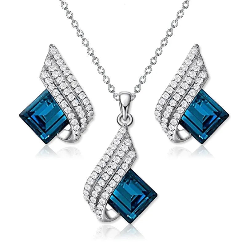 Women's necklace and earring set with cross chain design in alloy and glass with electroplated finish