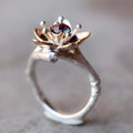 Silver two-tone floral geometric alloy ring showing detailed patterning