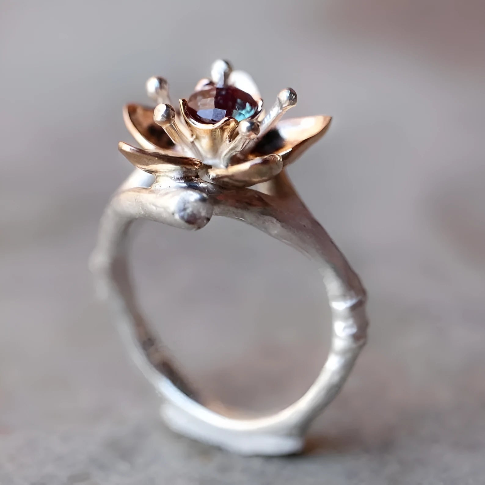 Silver two-tone floral geometric alloy ring showing detailed patterning