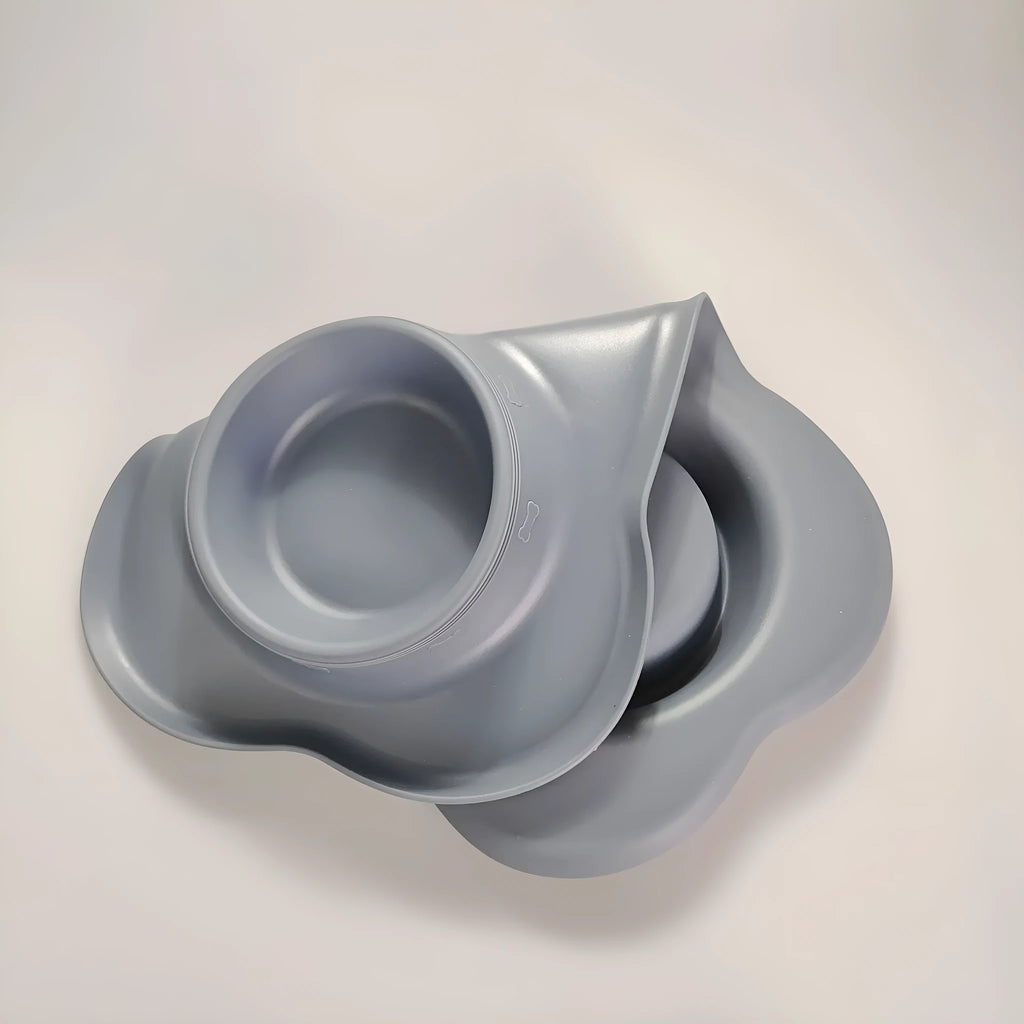 Large silicone dog bowl with a shiny stainless steel inner liner, shown in blue colour.