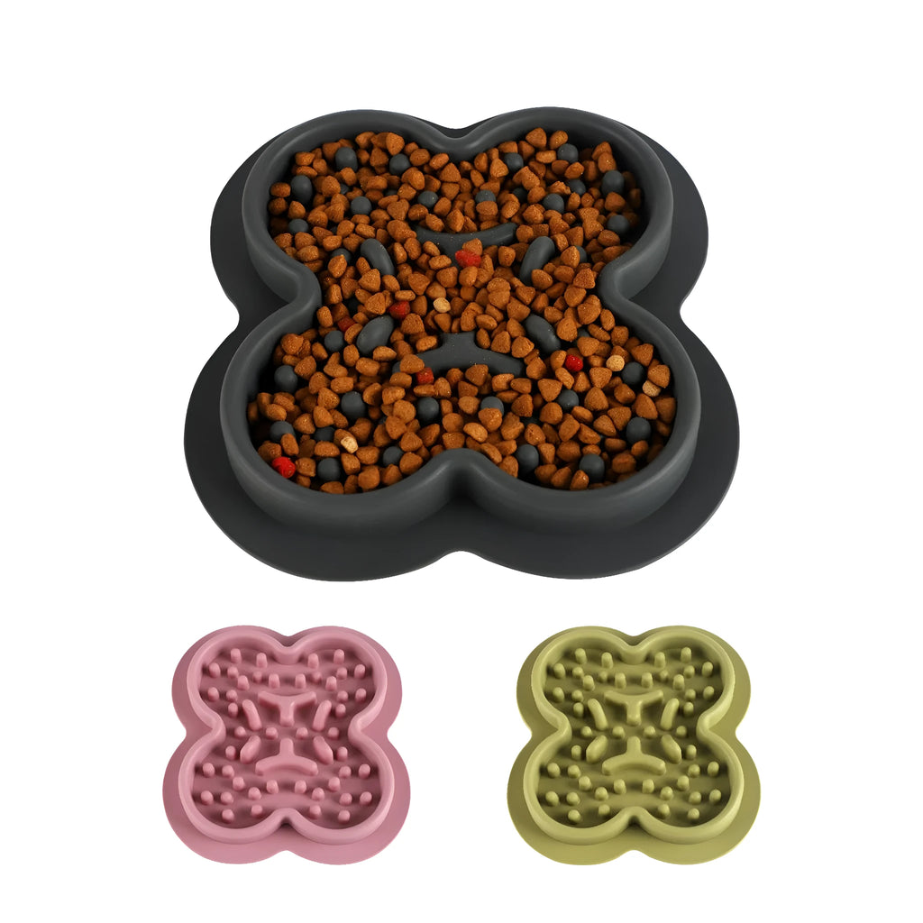 Silicone pet slow feeder licking pad mat in blue colour on a wooden floor.