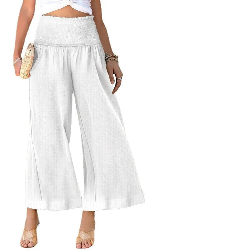 Women's high-waist pleated casual trousers in cotton linen, cropped straight-leg style.