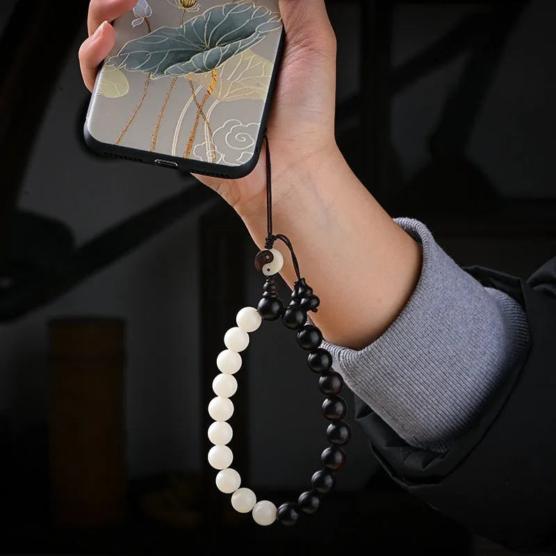 Handcrafted bodhi bead bracelet with eight-diagram pattern design featuring 11mm diameter beads