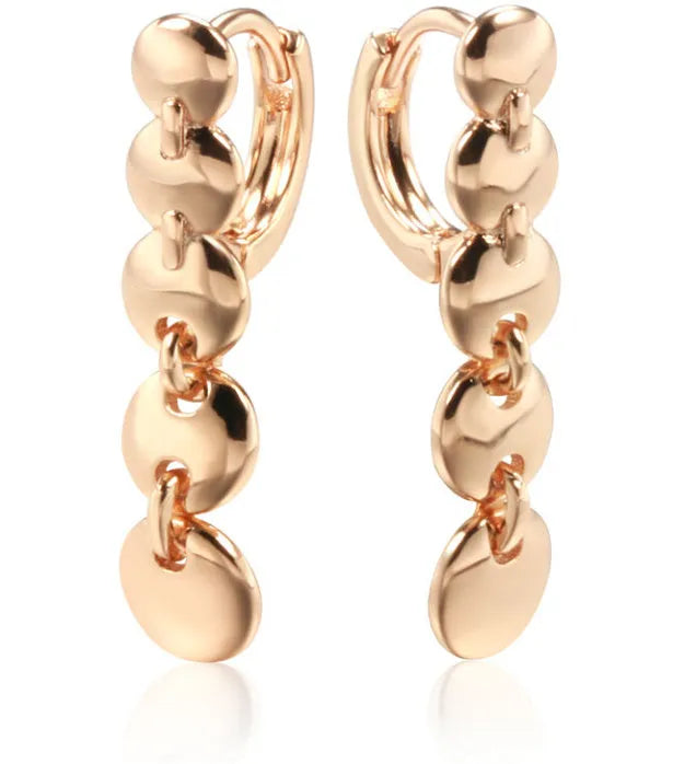 Retro gold-coloured copper circle earrings with woven texture and long dangle design