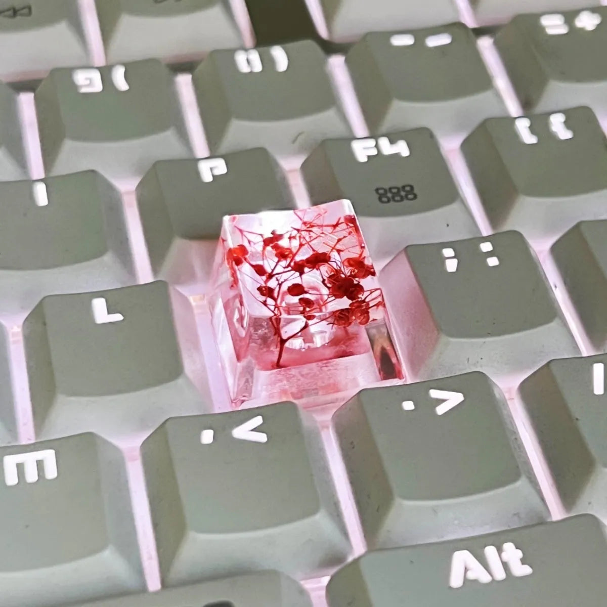 High transparency starry sky design resin keycap for mechanical keyboards in green colour.