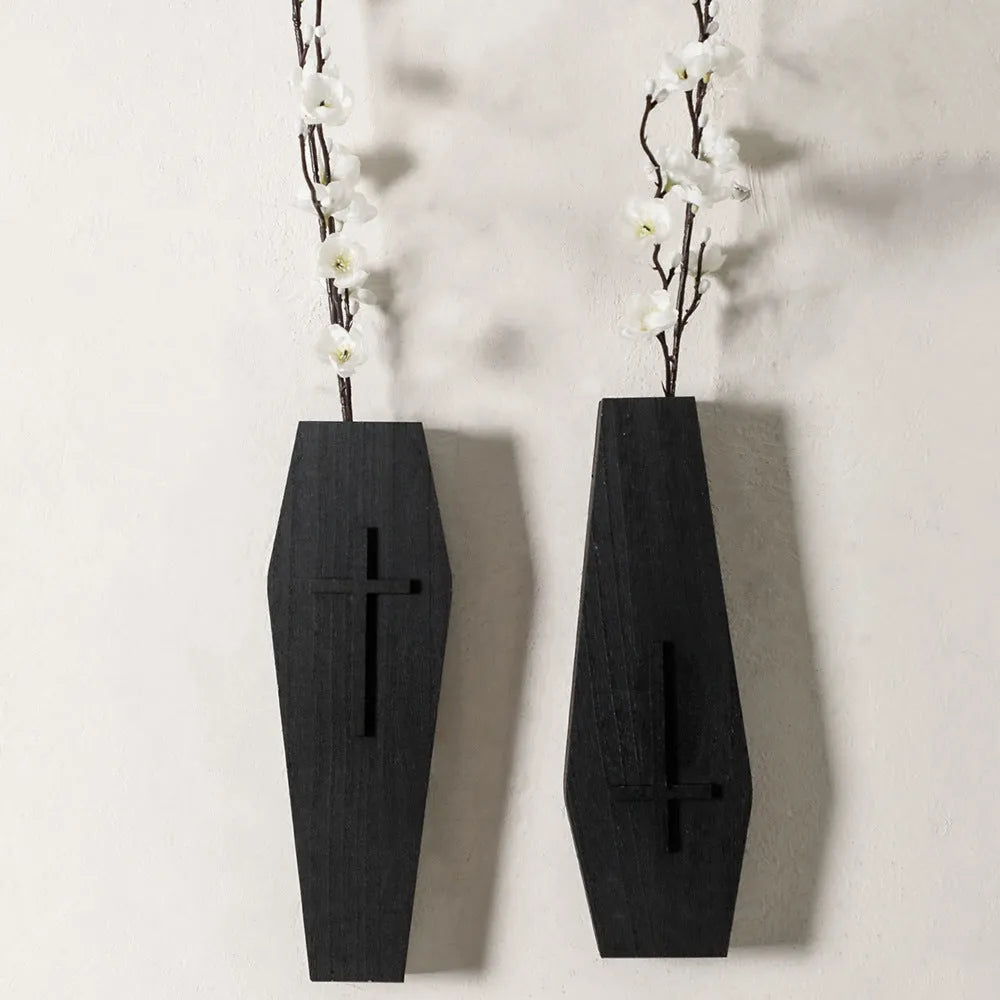 Black wooden cross wall shelf decoration with display ledge measuring 27 by 9 centimetres