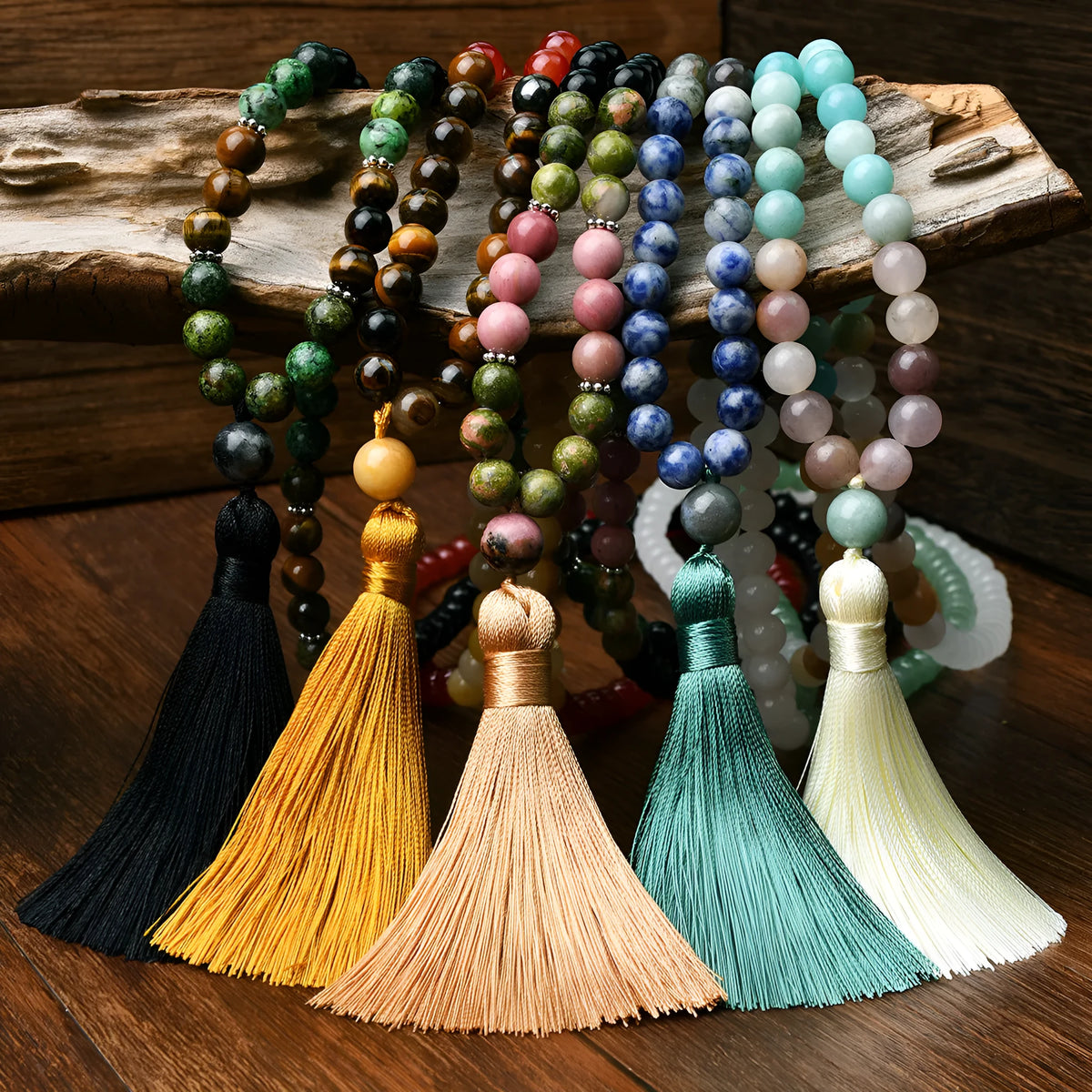 Handmade long beaded necklace with gemstone pendant and tassel, showing 81cm+ length.