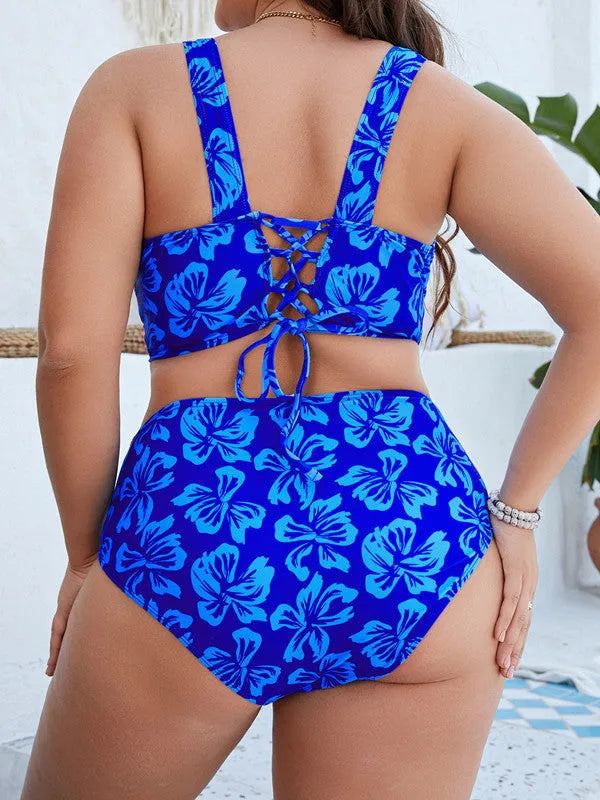 Blue floral patterned two-piece bikini swimsuit for plus size women.