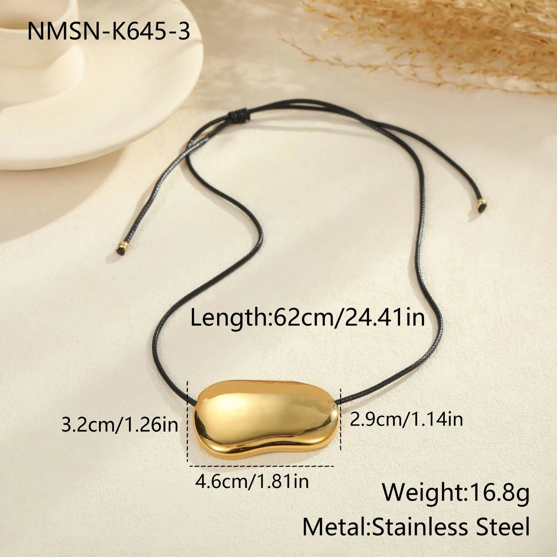 Stainless steel rope necklace with irregular geometric pendants in gold or silver electroplated finish