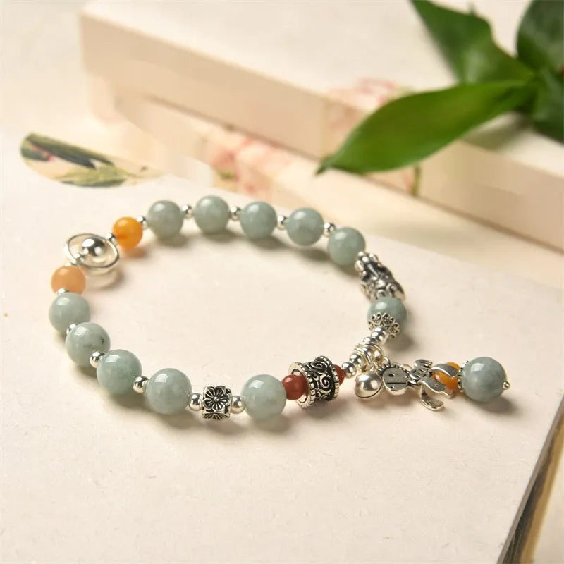 Natural emerald jade vintage bracelet with alloy fittings and retro styling