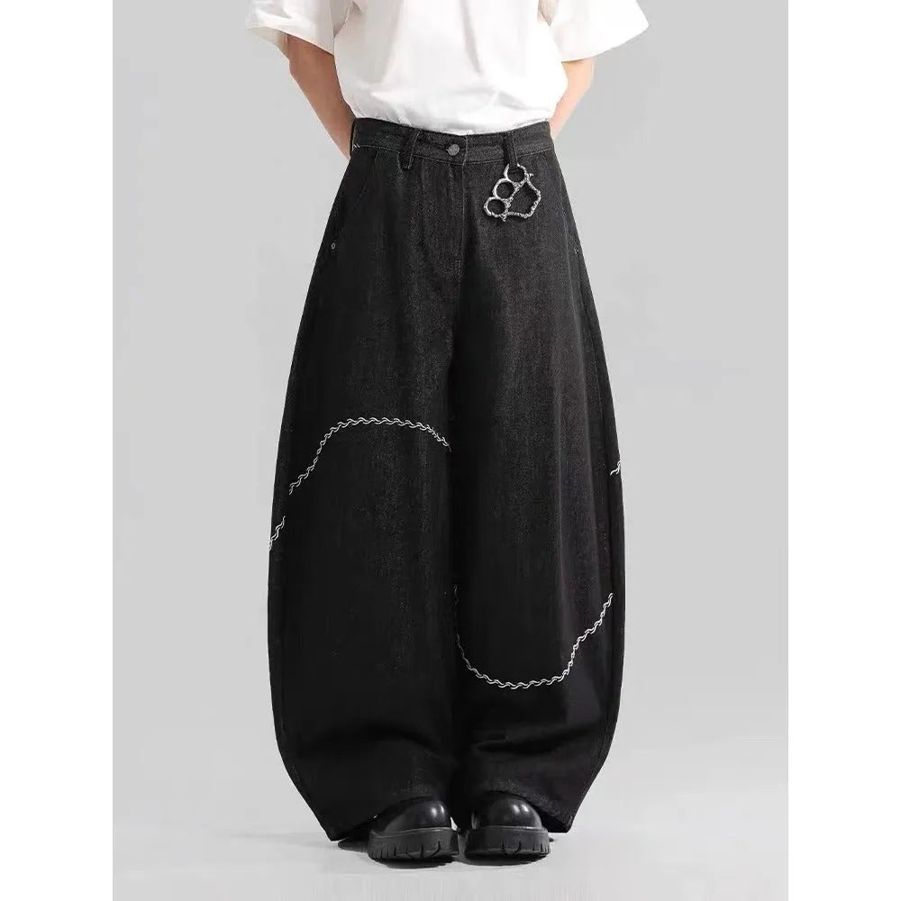 Black straight-leg denim trousers with mid waist and zip fly on mannequin