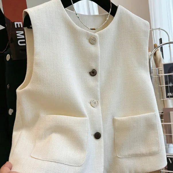 Women's sleeveless polyester bandage vest in milky white with round neck