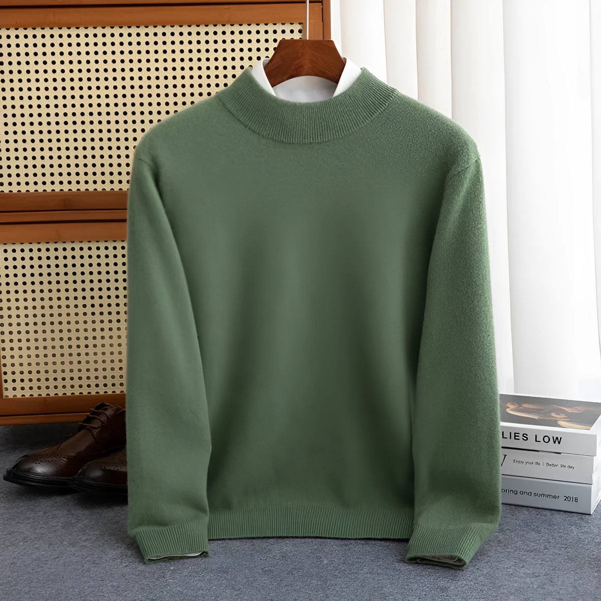 Man wearing a loose-fit half-collar wool sweater in a neutral colour for winter.