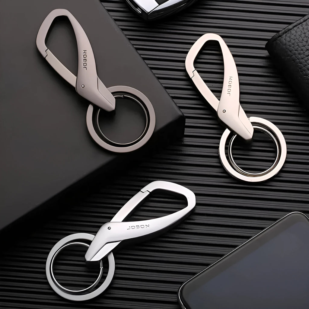 Zinc alloy double ring keychain in black, chrome, or nickel finish, measuring 8.3 by 3.5 cm.