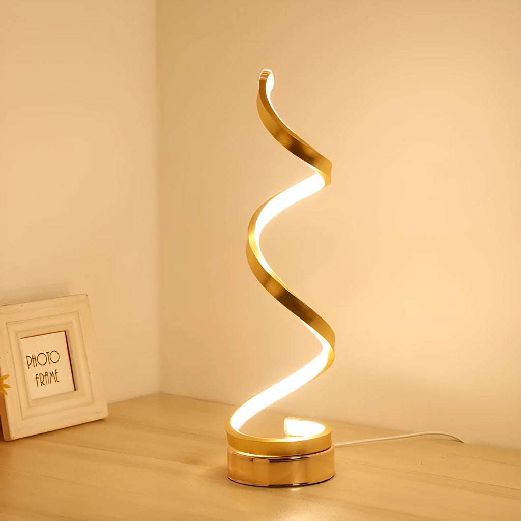 Minimalist black or white LED desk lamp with aluminium shade on a metal base.