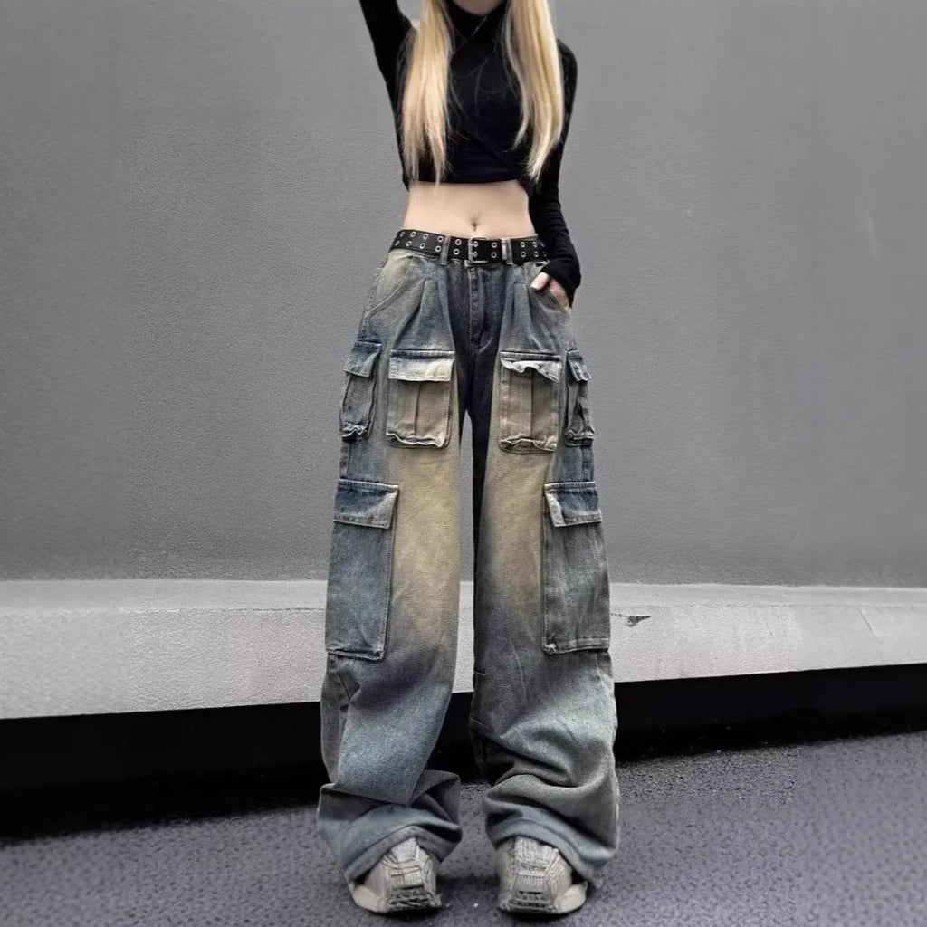 Loose fit multi-pocket distressed denim jeans in light blue colour with street hipster styling