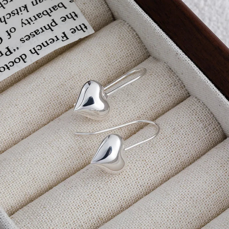 Silver heart-shaped Korean style earrings with 3D glossy finish and copper construction