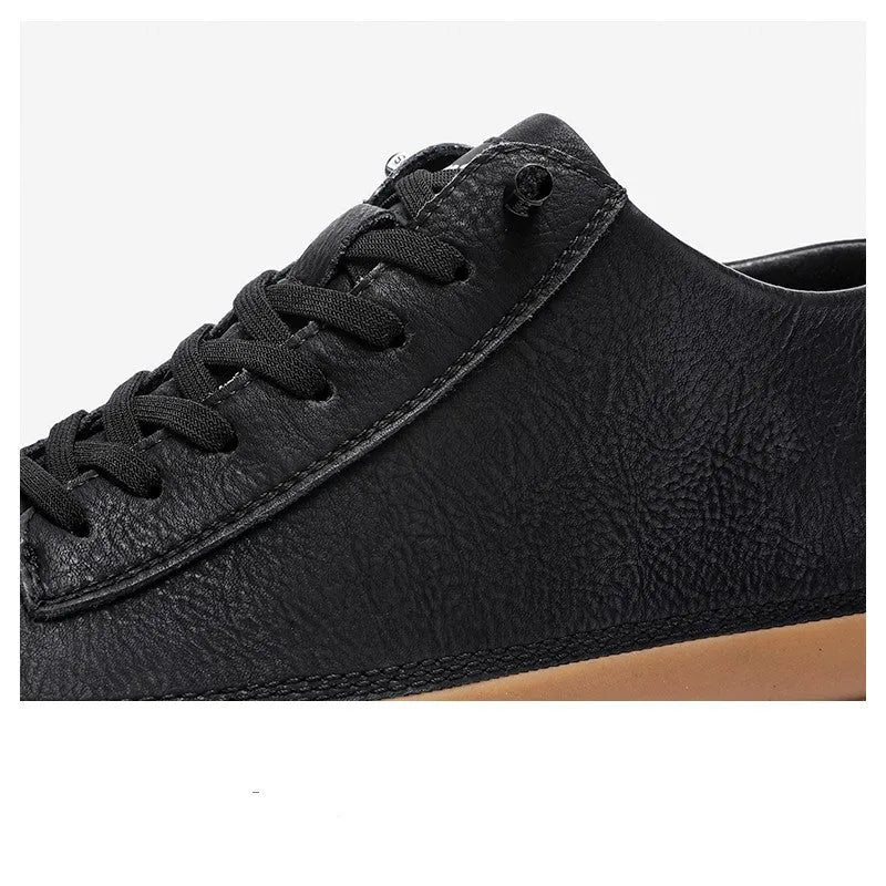 Men's black leather casual shoes with round toe and lace-up closure on rubber soles