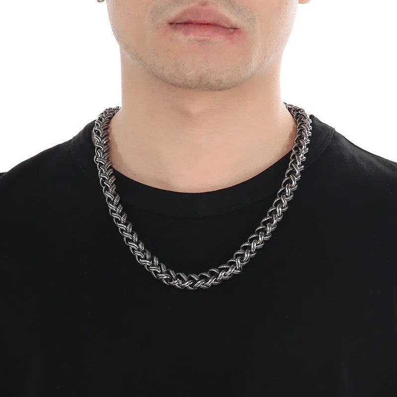 Men's titanium steel hemp flower chain necklace in antique silver finish with geometric twist design
