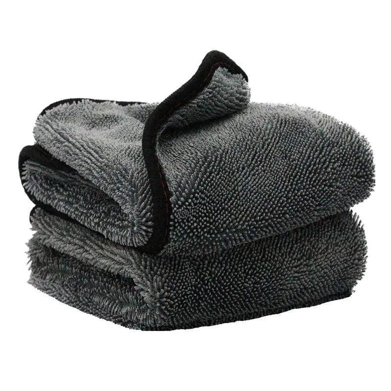 Grey 40x40 centimetre microfiber car wash and drying towel laid flat