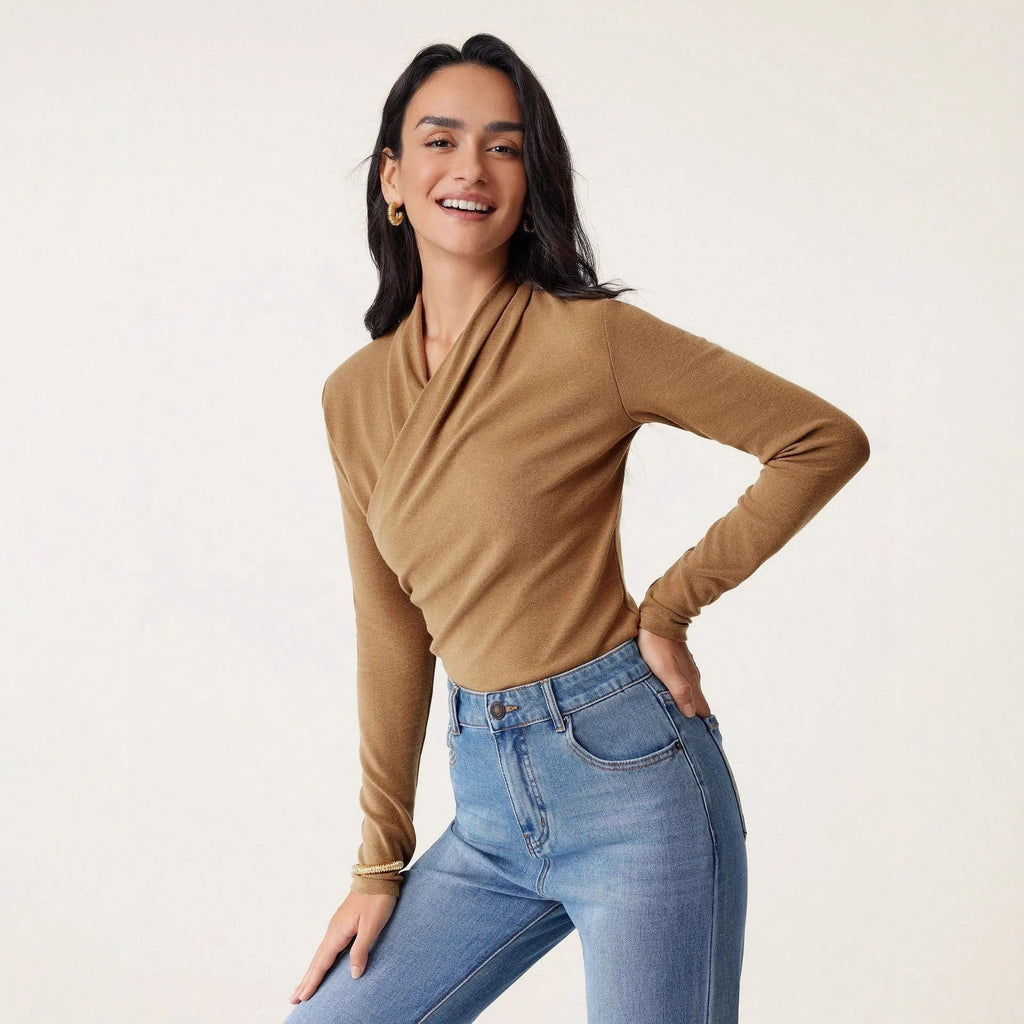 Camel coloured slim fit women's pullover sweater with long sleeves on hanger