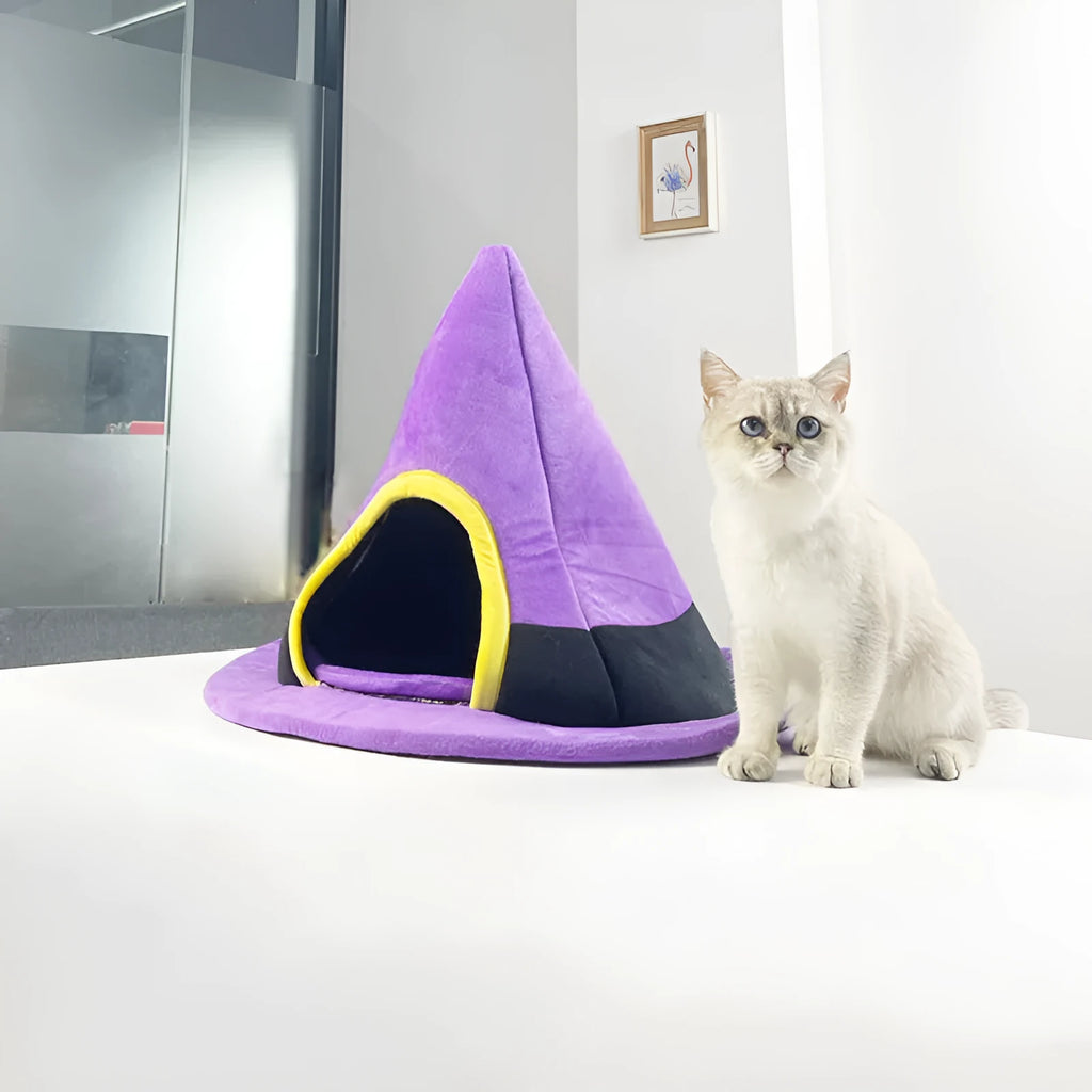 Purple Halloween witch hat shaped cat bed for cats measuring 60cm wide by 45cm high