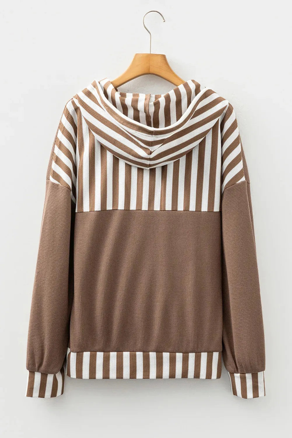 Straw yellow hoodie with waffle texture fabric and striped patchwork panels, button neck and drawstring waist