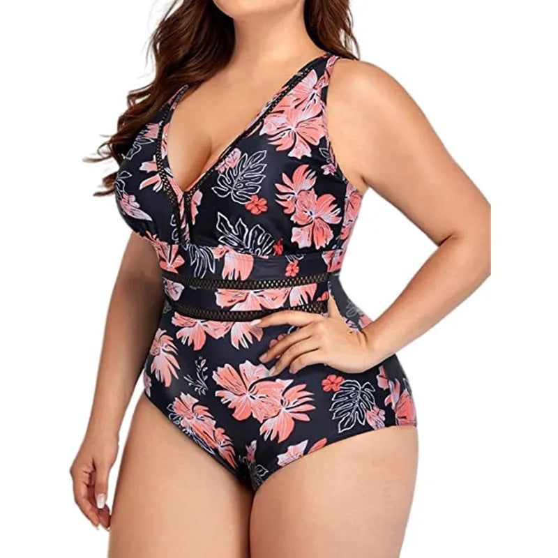 Black printed plus size women's bikini swimsuit on a hanger.