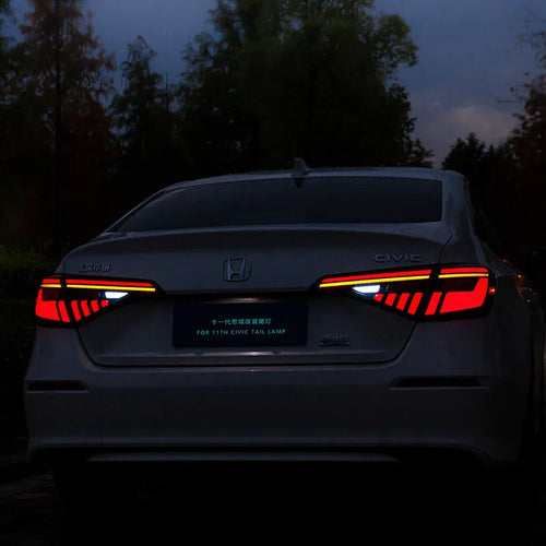 11th Generation Honda Civic black and red LED taillight assembly with sequential turn signals.