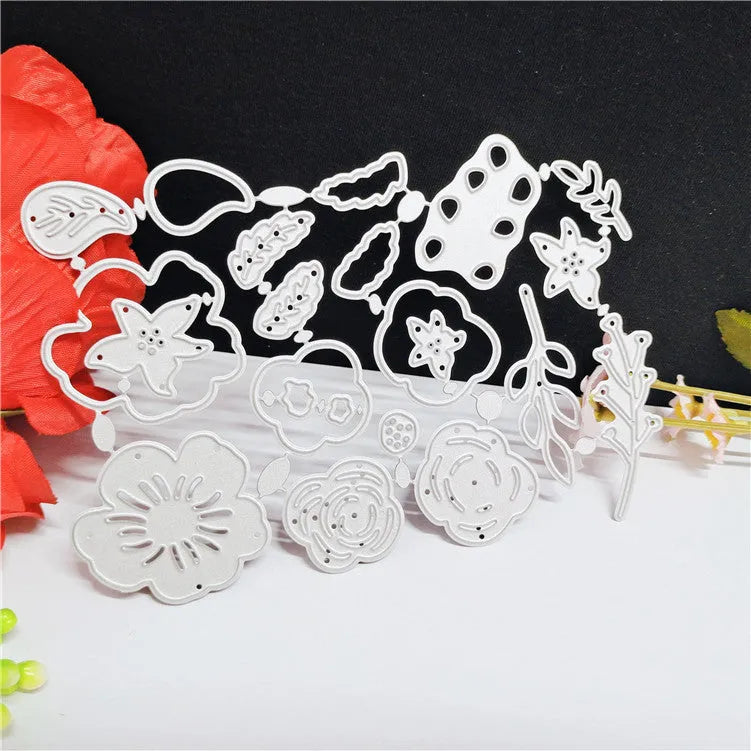 Silver carbon steel flower knife mold for paper cutting measuring 14.3 by 9.9 cm with etched plant design