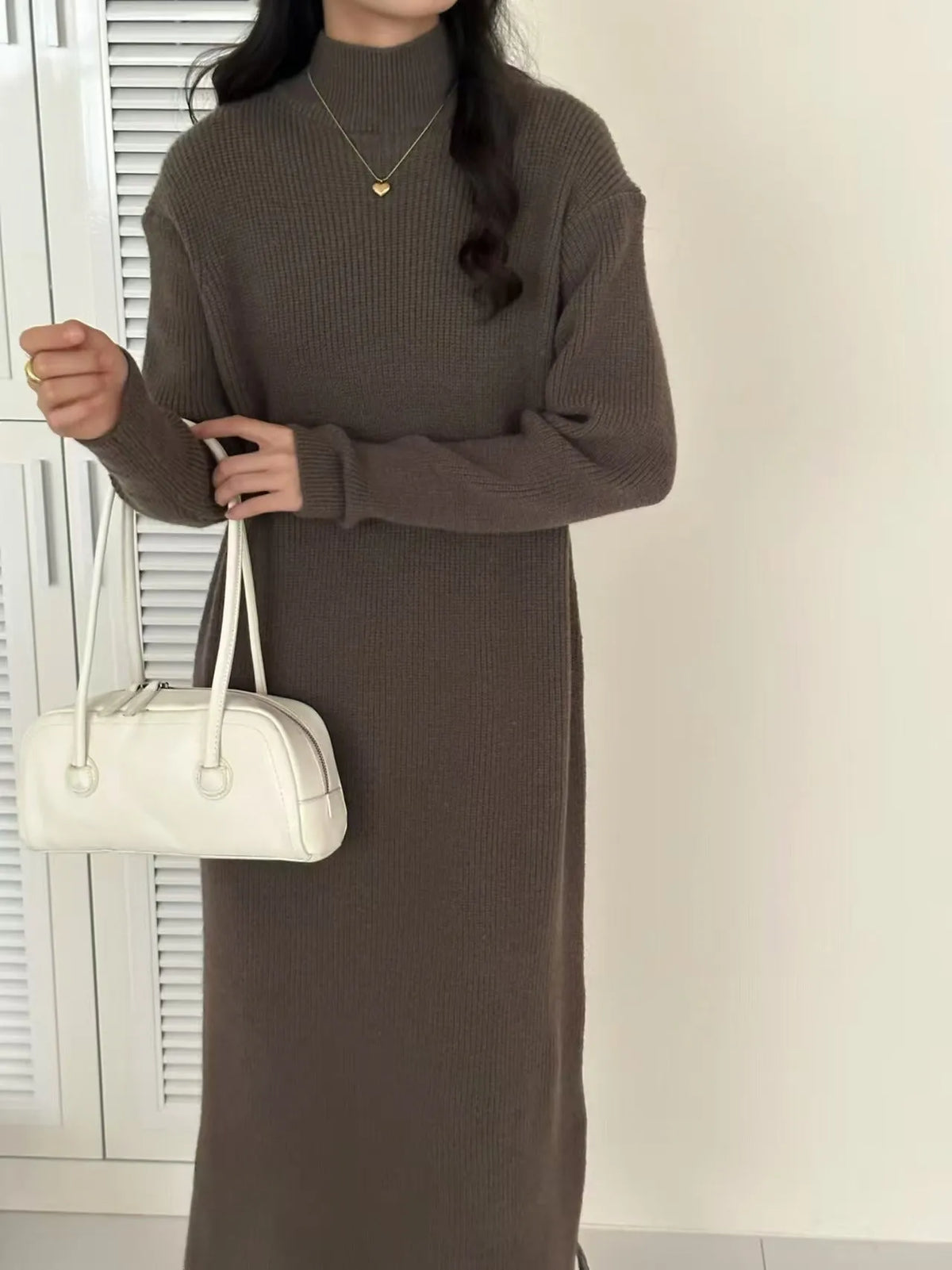 Acrylic half turtleneck knitted dress in graphite colour with high waist and overknee long length